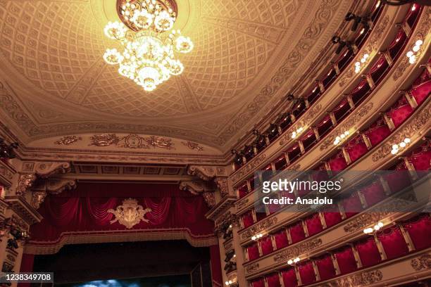 Chandelier, ceiling and balconies over the theatre foyer before the rehearsal of the opera at La Scala Theatre of Milano, Italy on February 08, 2022