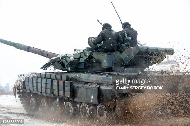 Ukrainian Military Forces servicemen of the 92nd mechanized brigade use tanks, self-propelled guns and other armored vehicles to conduct live-fire...