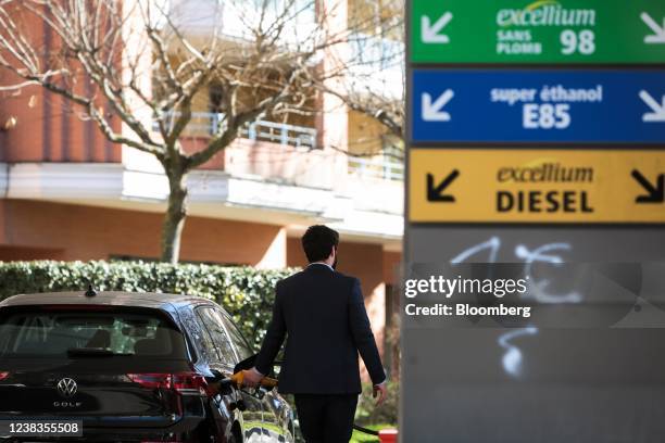 Customer refuels a vehicle at a TotalEnergies SE gas station in Toulouse, France, on Thursday, Feb. 10, 2022. TotalEnergies promised to increase its...