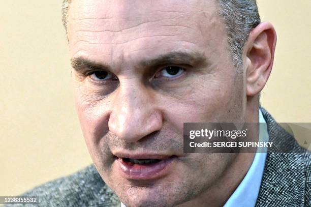 Heavyweight boxing champion, turned Kyiv mayor Vitali Klitschko, talks with AFP journalists at his office in Kyiv on February 10, 2022. - Vitali...