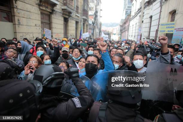 People shout slogans during the first day of the "Golpe de Estado II" trial against former President of Bolivia Jeanine Añez on February 10, 2022 in...