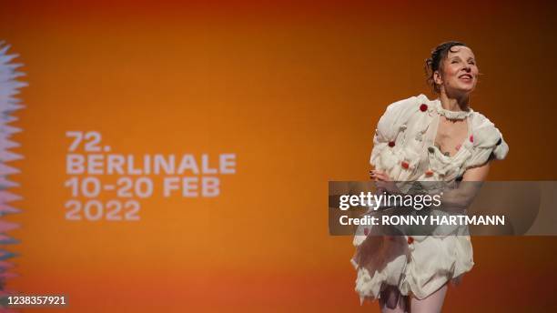 German actress and host Meret Becker speaks during the opening ceremony of the 72nd Berlinale Film Festival and the premiere of the film 'Peter von...
