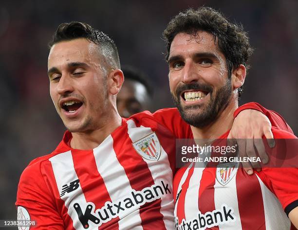 Athletic Bilbao's Spanish midfielder Raul Garcia celebrates with Athletic Bilbao's Spanish forward Alex Berenguer after scoring his team's first goal...