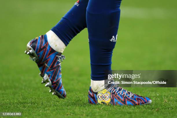 Cartoon minion on the boots worn by Alexandre Lacazette of Arsenal during the Premier League match between Wolverhampton Wanderers and Arsenal at...