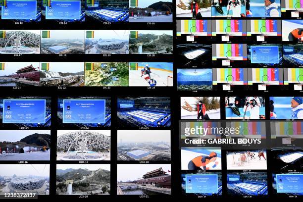 Picture shows screens in a Master Control Room of the Olympic Broadcasting Services in International Broadcast Centre in Beijing on February 11, 2022...