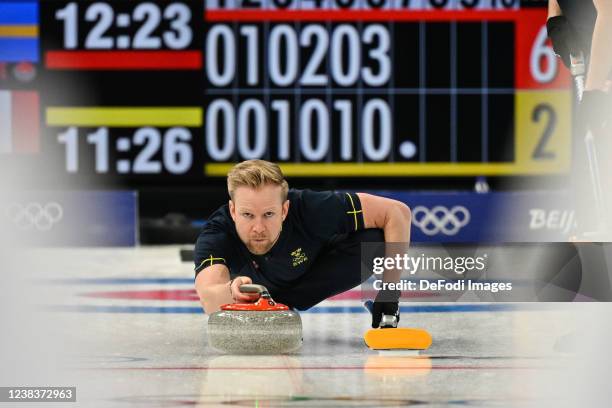 Niklas Edin of Sweden in action at the Curling Men's Round Robin Session 3 during the Beijing 2022 Winter Olympics at National Aquatics Centre on...