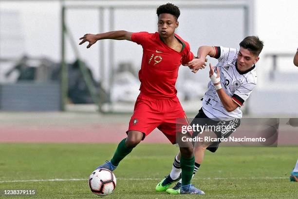 Samuel Di Benedetto of u17 Germany challenges Ussumane Djalo of u17 Portugal during the Algarve Cup U17 match between U17 Portugal vs U17 Germany at...