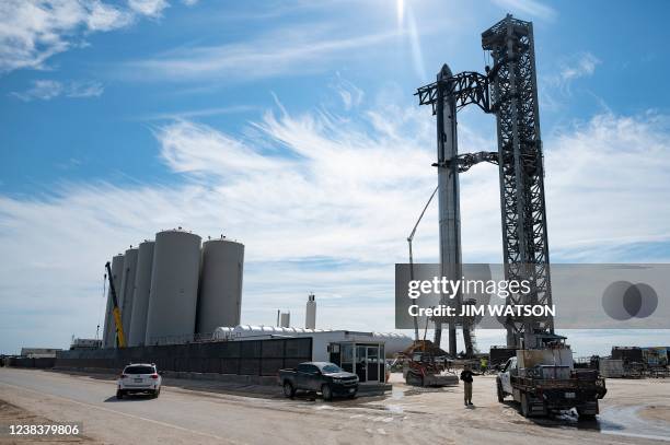 SpaceX's first orbital Starship SN20 is stacked atop its massive Super Heavy Booster 4 at the company's Starbase facility near Boca Chica Village in...