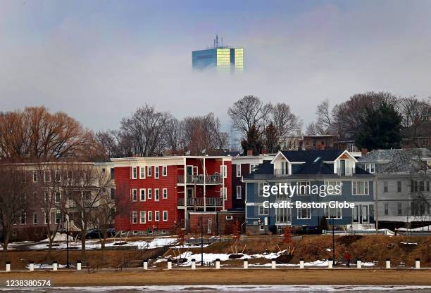 Foggy morning obstructs the view of the John Hancock Tower from Malibu Beach in Dorchester in Boston on Feb. 10, 2022.