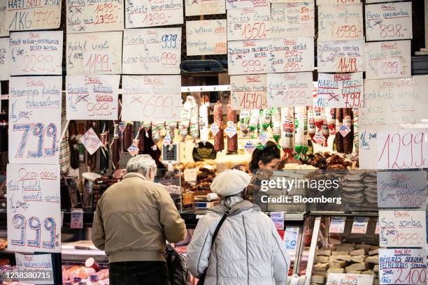 Hungarian forint price signs at a delicatessen counter in the Grand market hall in Budapest, Hungary, on Friday, Feb. 11, 2022. Prime Minister Viktor...