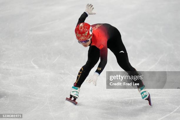 Wenlong Li of Team China crashes during the Men's 5000m Relay Semifinals on day seven of the Beijing 2022 Winter Olympic Games at Capital Indoor...