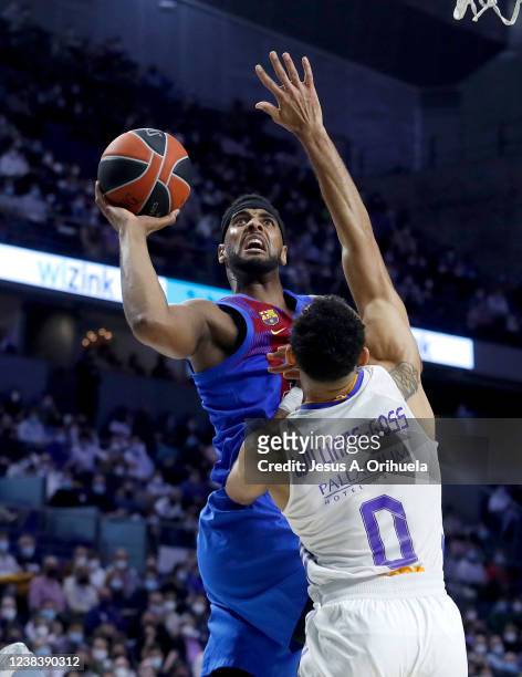 Brandon Davies, #0 of FC Barcelona goes to the basket against Nigel Williams-Goss, #0 of Real Madrid during the Turkish Airlines EuroLeague Regular...
