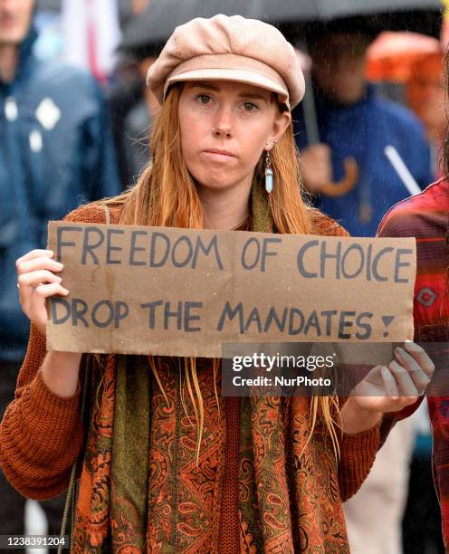 Member of the Freedom and Rights Coalition takes part in a protest outside the police station in Christchurch, New Zealand on February 12, 2022...