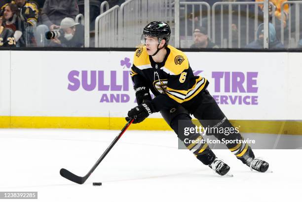 Boston Bruins left defenseman Mike Reilly looks up ice during a game between the Boston Bruins and the Carolina Hurricanes on February 10, 2022 at TD...