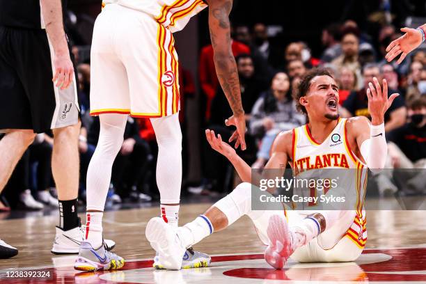 Trae Young of the Atlanta Hawks yells after not getting a foul call during the second half of a game against the San Antonio Spurs at State Farm...