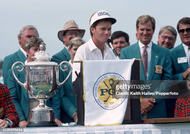 Jeff Sluman of the United States during the trophy presentation after winning the United States PGA Championship at Oak Tree Golf Club on August 14,...
