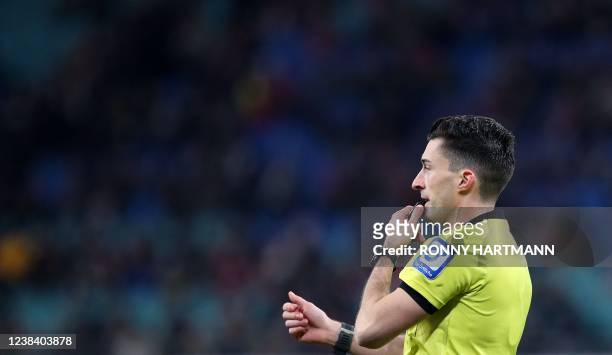 German referee Florian Badstuebner blows the whistle during the German first division Bundesliga football match between RB Leipzig and FC Cologne in...