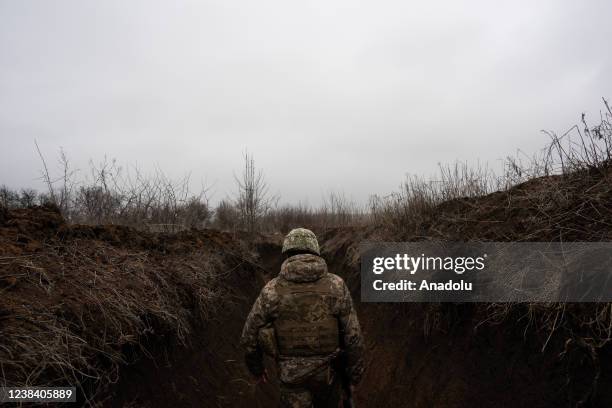 Ukrainian soldier is seen outside of Svitlodarsk, Ukraine on February 12, 2022.