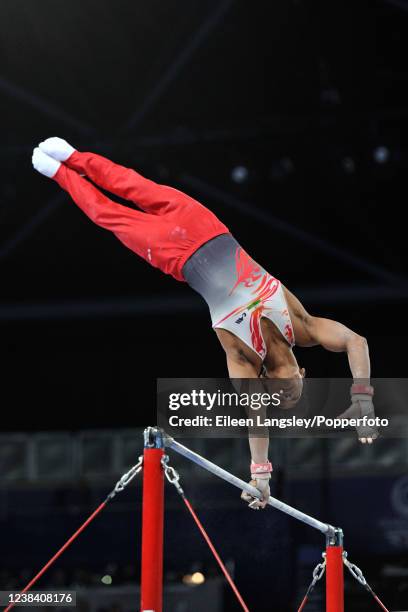 Ashish Kumar of India competing on horizontal bar in the men's all-round final competition during the 2014 Commonwealth Games at the SSE Hydro Arena,...