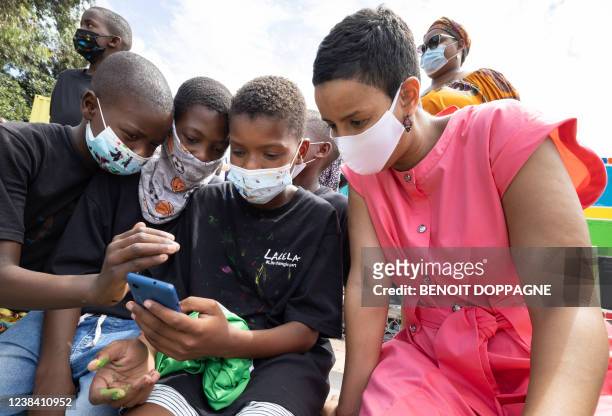Minister for Development Cooperation Meryame Kitir talks to children during a visit to Philippi Village, during a mission to South Africa of the...