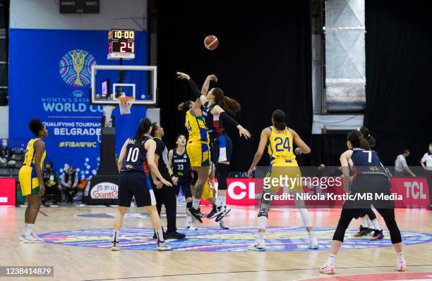 Erika De Souza of Brazil and Ji Su Park of Korea jump for the ball during the FIBA Women's Basketball World Cup Qualifying Tournament match between...
