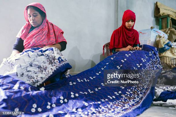 Embroidery machine have been seen producing embroidery clothes at a factory in Dhaka, Bangladesh on February 12, 2022.