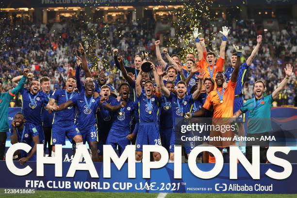 Cesar Azpilicueta of Chelsea lifts the FIFA Club World Cup UAE 2021 trophy and celebrates winning during the FIFA Club World Cup UAE 2021 Final match...