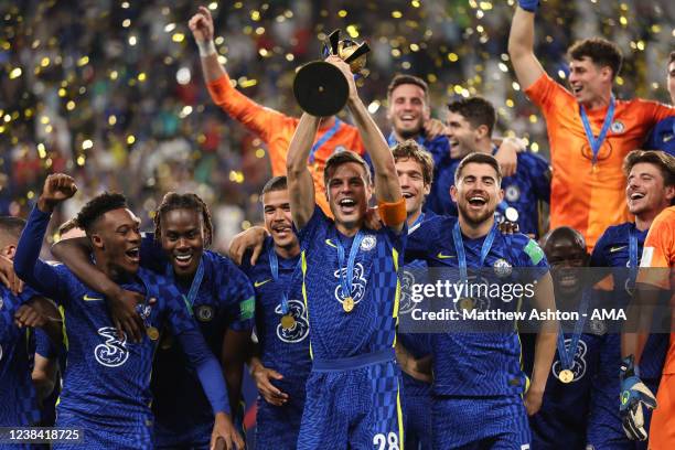 Cesar Azpilicueta of Chelsea lifts the FIFA Club World Cup UAE 2021 trophy and celebrates winning with team mates during the FIFA Club World Cup UAE...