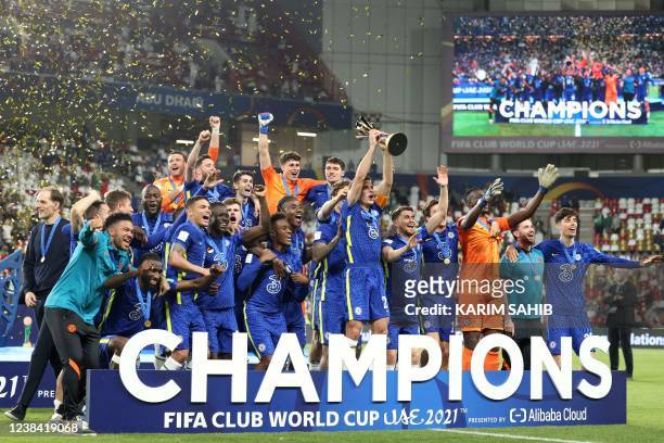 Chelsea's players celebrate with their trophy after winning the 2021 FIFA Club World Cup final football match against Brazil's Palmeiras at Mohammed...