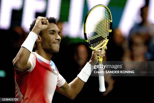 Canada's Felix Auger-Aliassime celebrates after winning over Russia's Andrey Rublev their men's semi-final singles match on day six of the ABN AMRO...