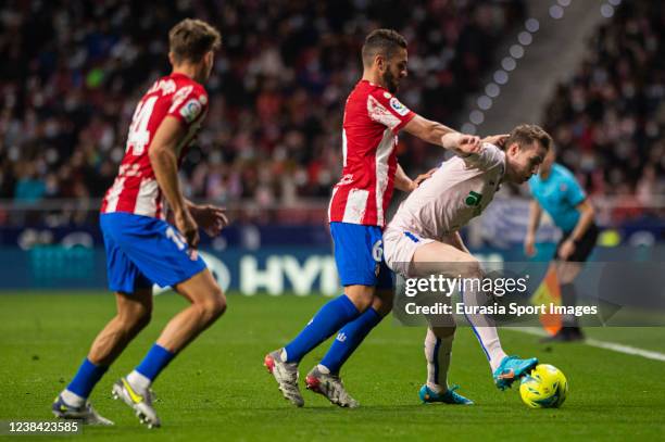 Jorge Resurreccion koke of Atletico de Madrid battles for the ball with Jakub Jankto of Getafe Cf during the LaLiga Santander match between Club...