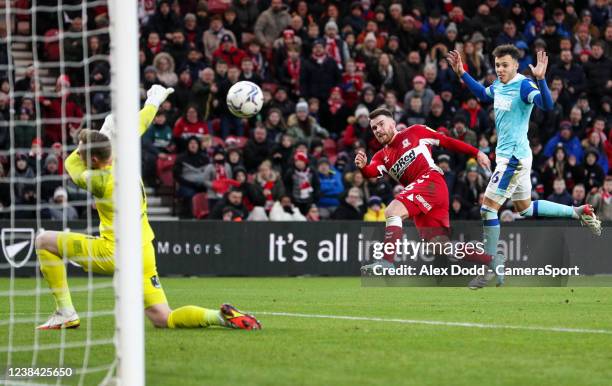 Middlesbrough's Aaron Connolly sees his shot saved by Derby County's Ryan Allsop during the Sky Bet Championship match between Middlesbrough and...