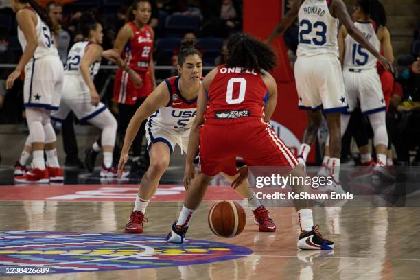Kelsey Plum of the USA Womens National Team plays defense on Jennifer O'Neill of the Puerto Rico Women's National Basketball Team during the game on...