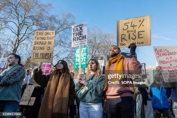 Protestors seen holding placards expressing their opinion, during the demonstration. The Office of Gas and Electricity Markets announced that from...