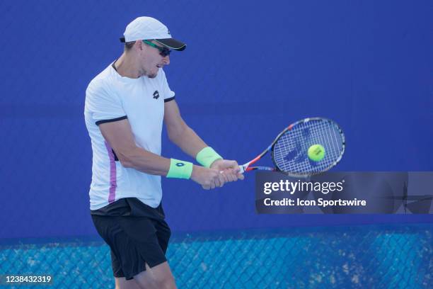 Denis Istomin competes during the qualifying round of the ATP Delray Beach Open on February 12 at the Delray Beach Stadium & Tennis Center in Delray...