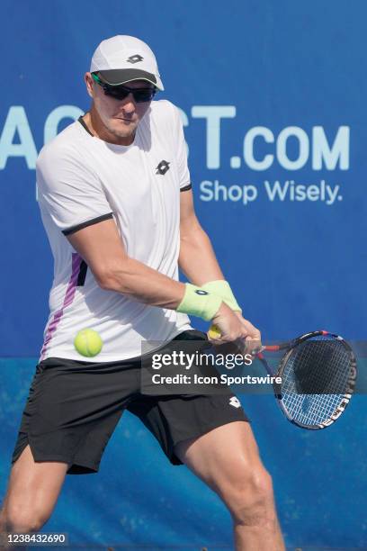 Denis Istomin competes during the qualifying round of the ATP Delray Beach Open on February 12 at the Delray Beach Stadium & Tennis Center in Delray...
