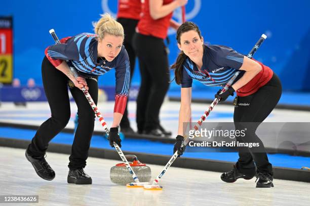 Nina Roth of USA and Tara Peterson of USA in action at the women's Curling session 6 preliminary round match between USA and Sweden during the...