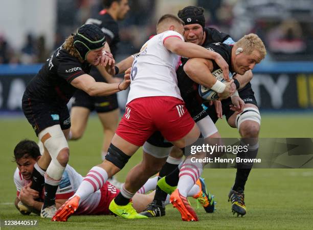 Vincent Koch of Saracens is tackled by Matas Jurevicius of Harlequins during the Gallagher Premiership Rugby match between Saracens and Harlequins at...