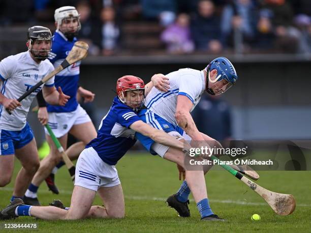 Waterford , Ireland - 13 February 2022; Austin Gleeson of Waterford is tackled by Fiachra Fennell of Laois during the Allianz Hurling League Division...