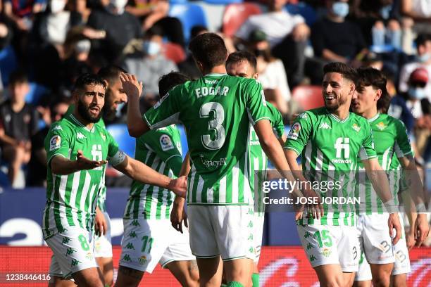 Real Betis' French midfielder Nabil Fekir and Real Betis' Spanish defender Edgar Gonzalez celebrate after scoring a goal during the Spanish league...