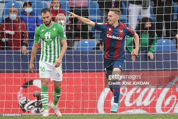 Levante's Spanish forward Dani Gomez celebrates after scoring a goal during the Spanish league football match between Levante UD and Real Betis at...