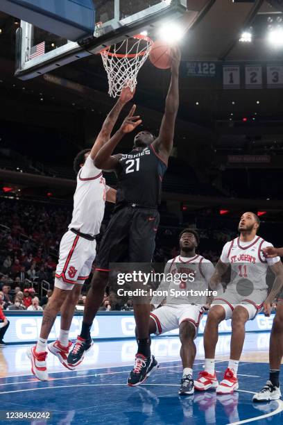 Connecticut Huskies Forward Adama Sanogo s shoots a layup during the first half of the College Basketball game between the UConn Huskies and St....