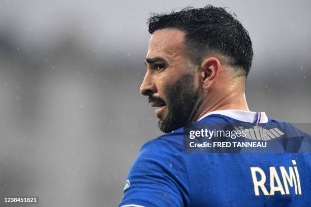 Troyes' French defender Adil Rami looks on during the French L1 football match between Stade Brestois 29 and Troyes at the Francis-Le Ble stadium, in...