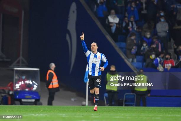 Espanyol's Spanish forward Raul de Tomas celebrates after scoring a goal during the Spanish league football match between RCD Espanyol and FC...