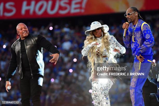 Rapper Dr. Dre, US singer-songwriter Mary J. Blige and US rapper Snoop Dogg perform during the halftime show of Super Bowl LVI between the Los...