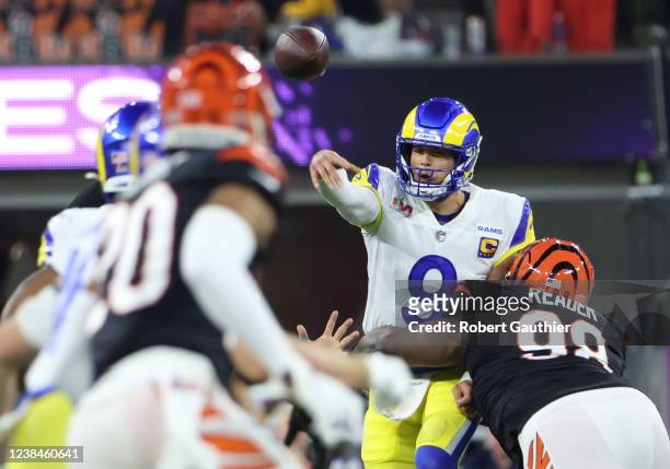 Los Angeles Rams quarterback Matthew Stafford throws a pass under pressure during the second half of Super Bowl LVI at SoFi Stadium on Sunday, Feb....