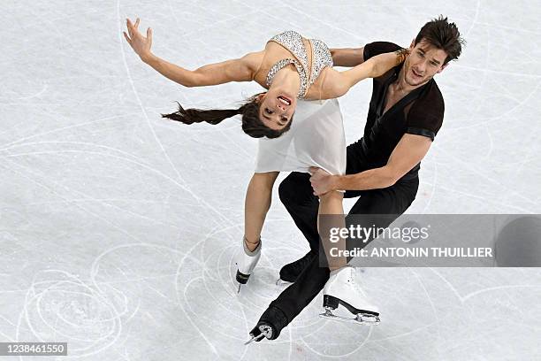 Canada's Laurence Fournier Beaudry and Canada's Nikolaj Soerensen compete in the ice dance free dance of the figure skating event during the Beijing...
