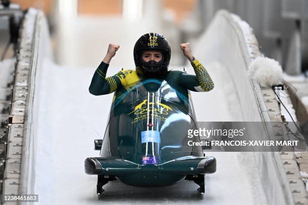 Australia's Breeana Walker reacts after her final run in the women's monobob bobsleigh event at the Yanqing National Sliding Centre during the...