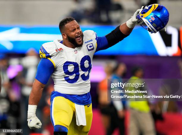 Inglewood, CA Aaron Donald of the Los Angeles Rams celebrates after the Rams defeat the Cincinnati Bengals 23-20 in the NFL Super Bowl LVI football...