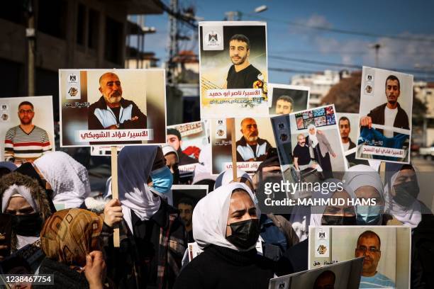 Palestinians rally in support of Palestinian prisoners in Israeli jails, outside the International Committee of the Red Cross building in Gaza City...